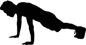 Man som svart siluett mot vit botten som gör armböjningar. Foto: Mohamed Hassan, Pixabay